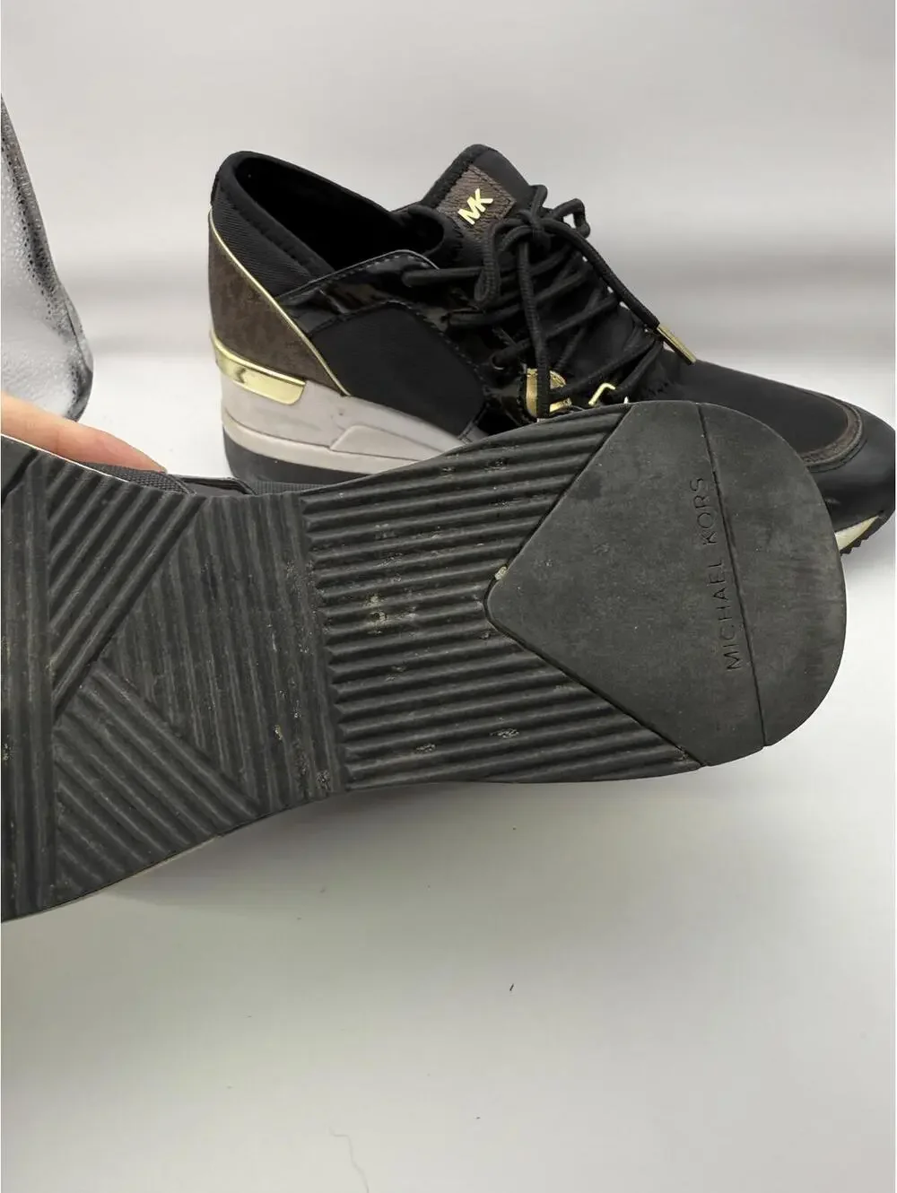 Michael Kors Women's Black and Gold Wedge Sneakers 8.5